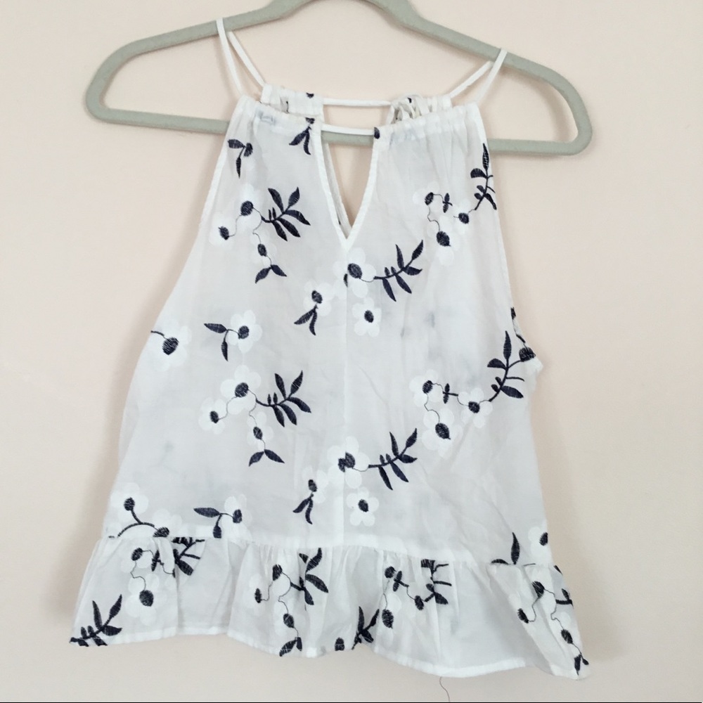 White tank top with a blue floral print!